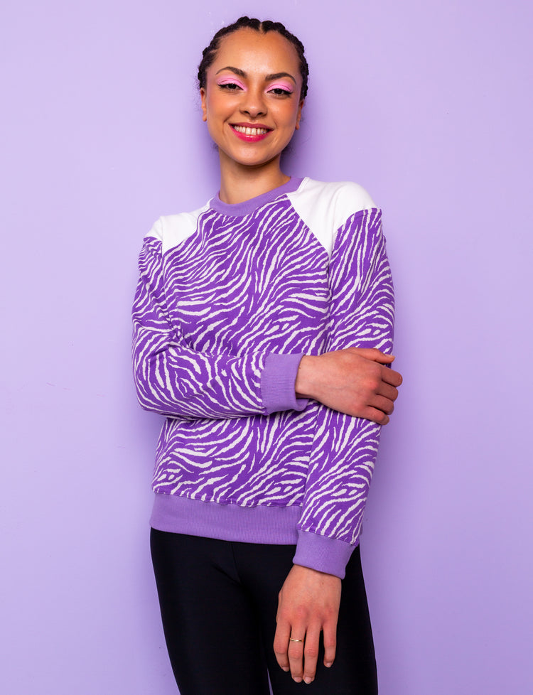 lilac and white zebra print sweatshirt with white shoulders