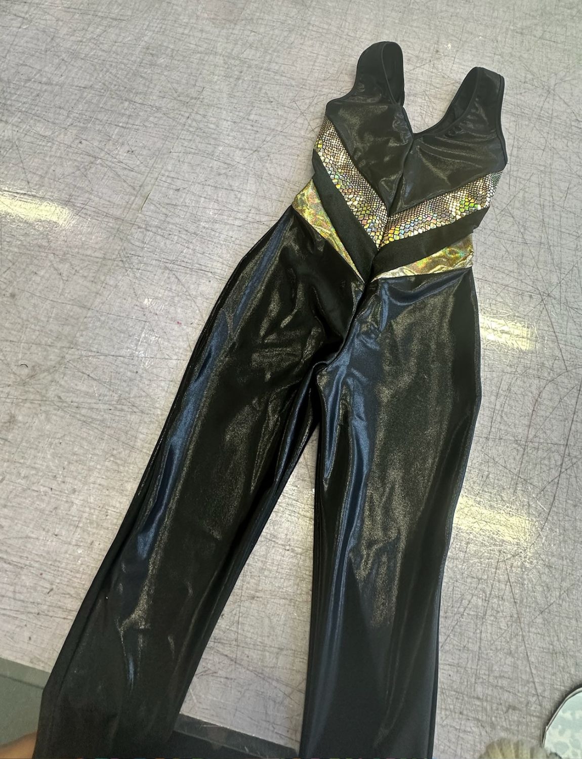 Black metallic panelled lycra catsuit.