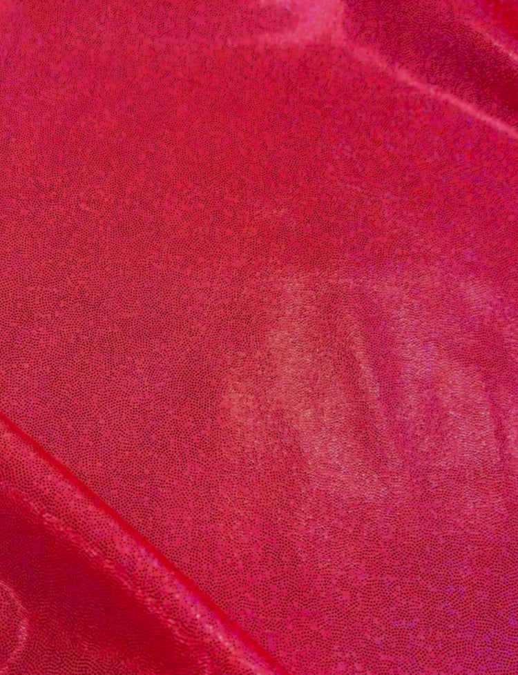Coral pink holographic foil spandex fabric.