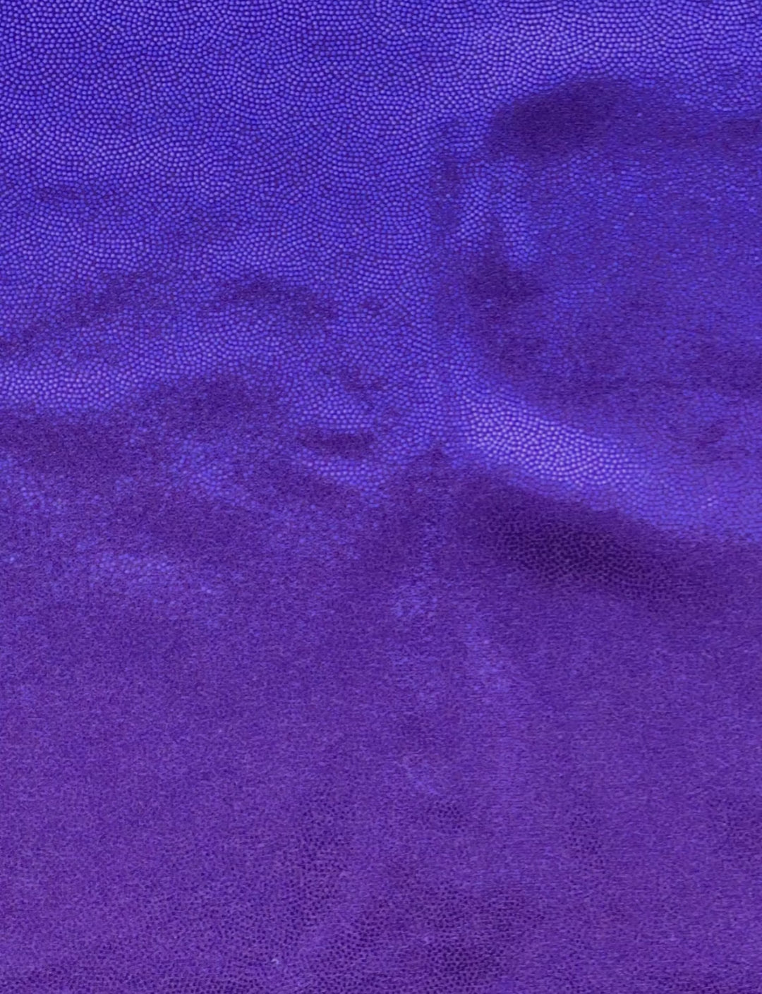 Purple foil on purple stretch fabric.