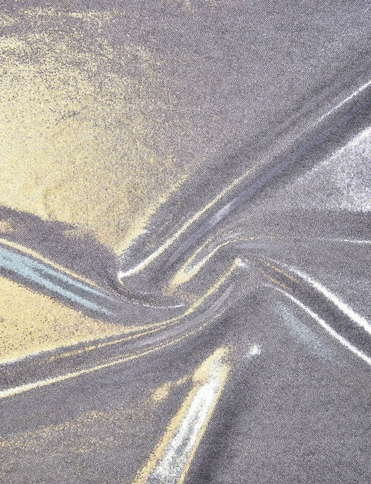 Silver foil stretch fabric swatch.